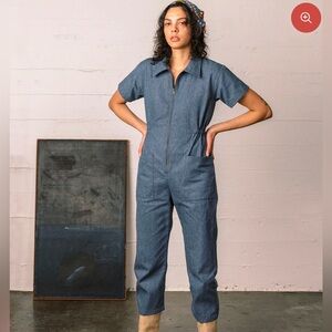 Noble utility jumpsuit in denim.